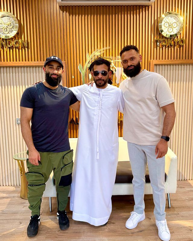 Nazir Ahmed with two friends in Dubai