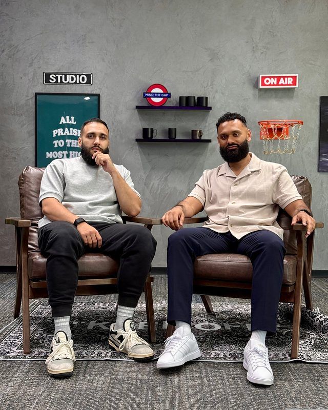 Nazir Ahmed with a guest in a podcast studio
