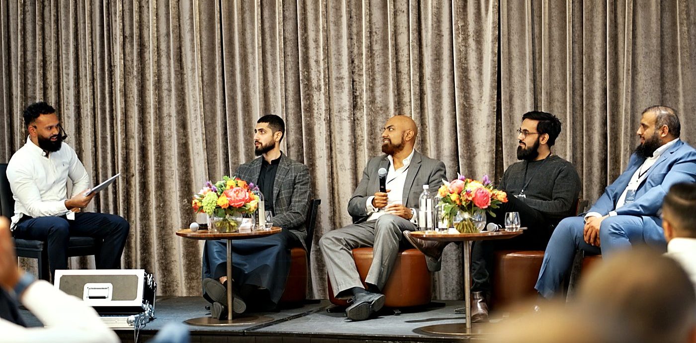 A panel at an investor summit